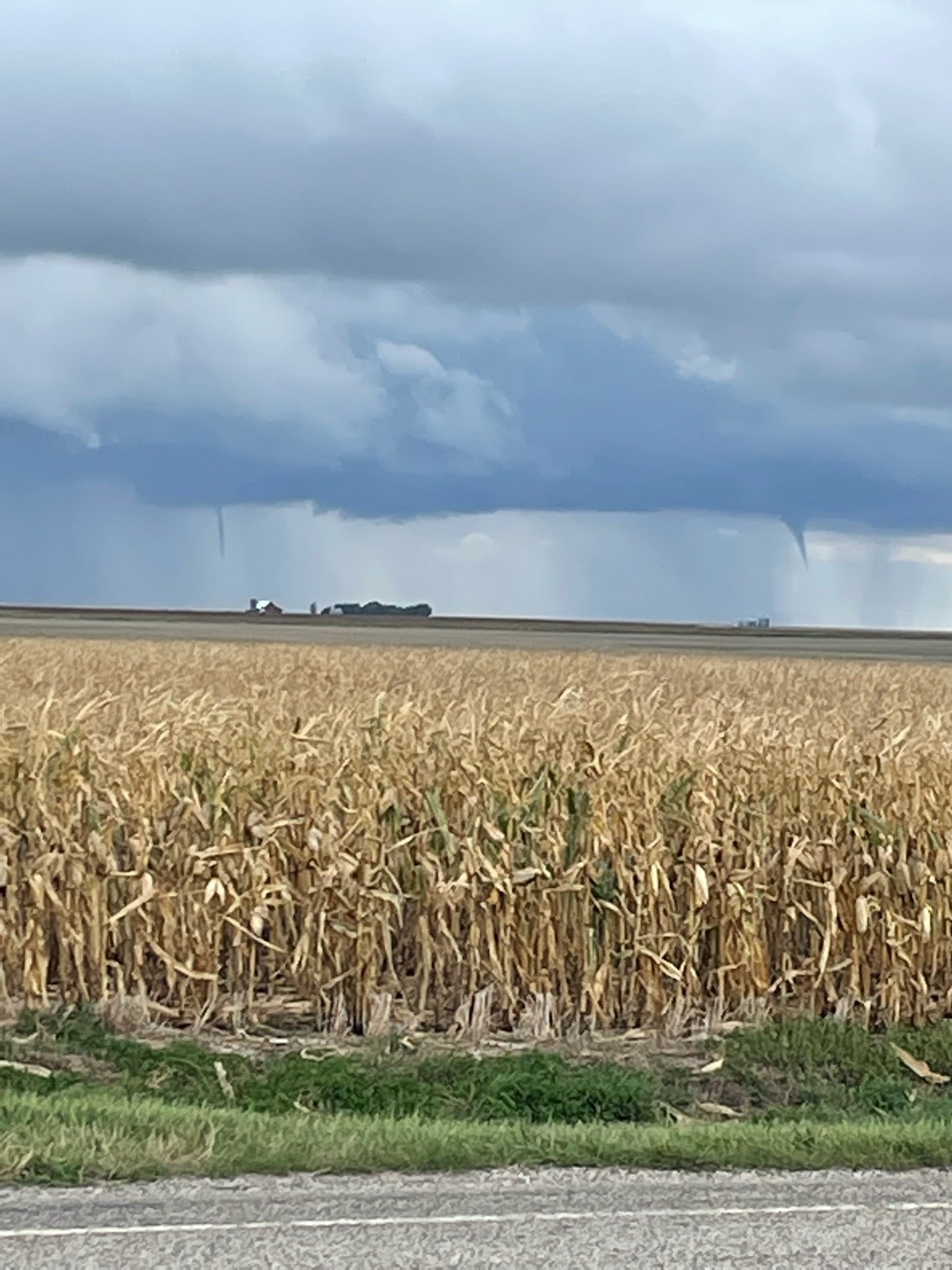 Two landspout funnels (one briefly touched down) located 4 miles west of Onida at approximately 1:15 PM.Â  (Photo from Sully County EM)