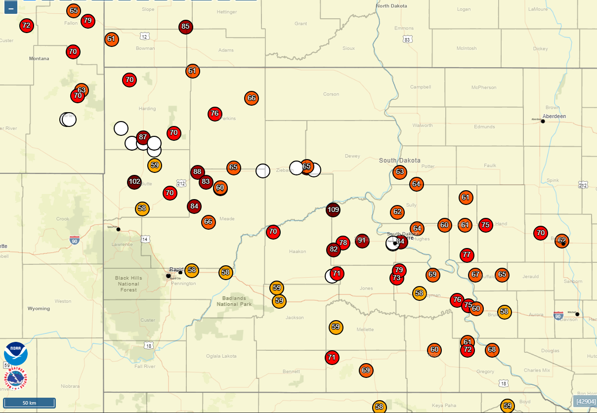 Map of severe wind reports (58 mph or greater) and wind damage (white circles) from the event during the evening of July 13th into the early morning hours of July 14th.  