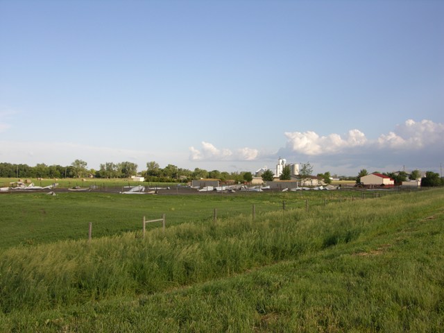 Outbuilding destroyed and strewn into a field. Photo by NWS Staff. 