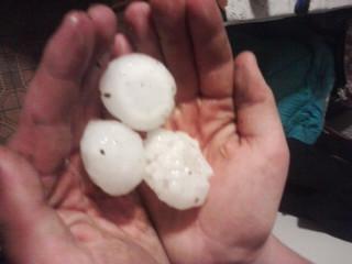 Hail up to golf ball size, near Heartwell, NE. Photo courtesy of Sherry Reichstein.