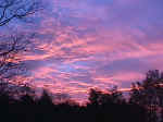 The sun rising over Tri-County Fish and Wildlife Area, near North Webster, Indiana.  Taken from the weather office, when it was housed in temporary trailers before the new building was erected.